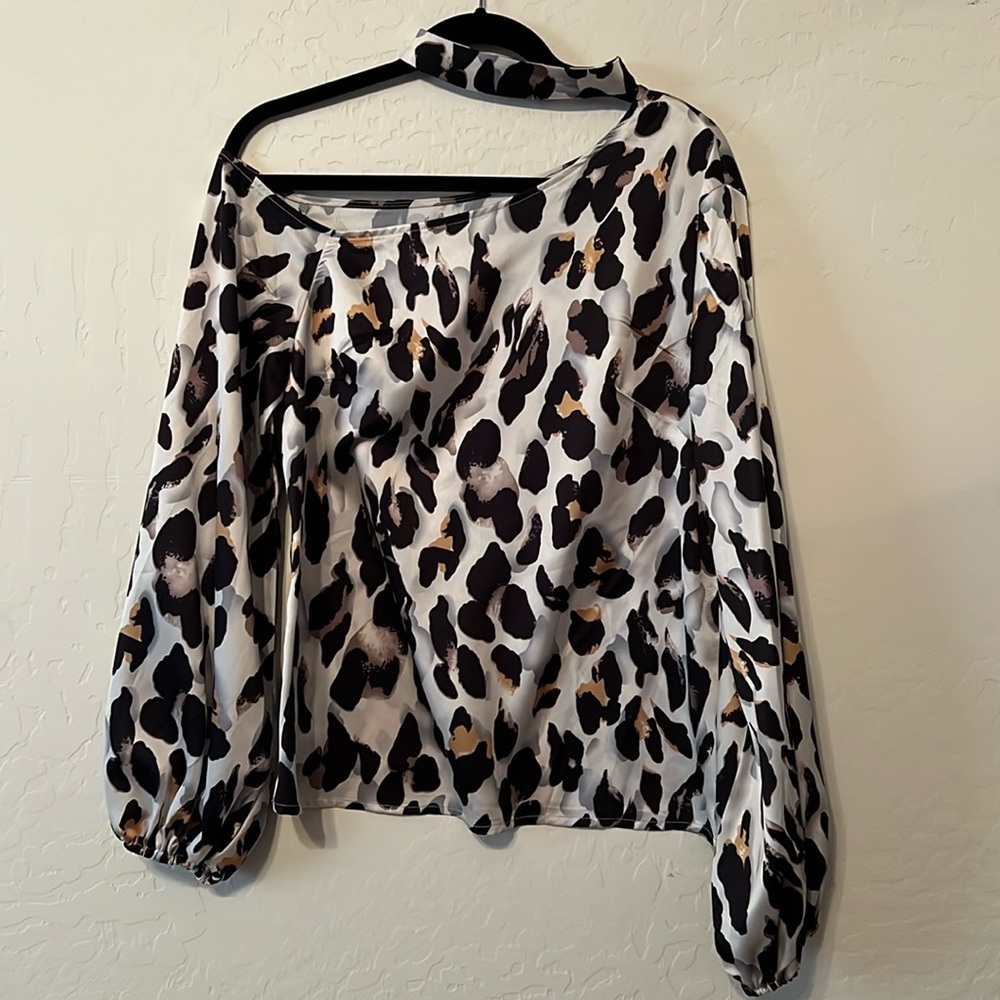 Beautiful one shoulder leopard print blouse. Women Size Large. Never worn